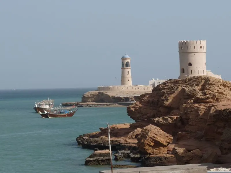 Tower_and_lighthouse,_Sur,_Oman_-_Pixabay.jpg